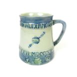 A William Moorcroft King Edward VII Coronation commemorative Day mug, circa 1902
