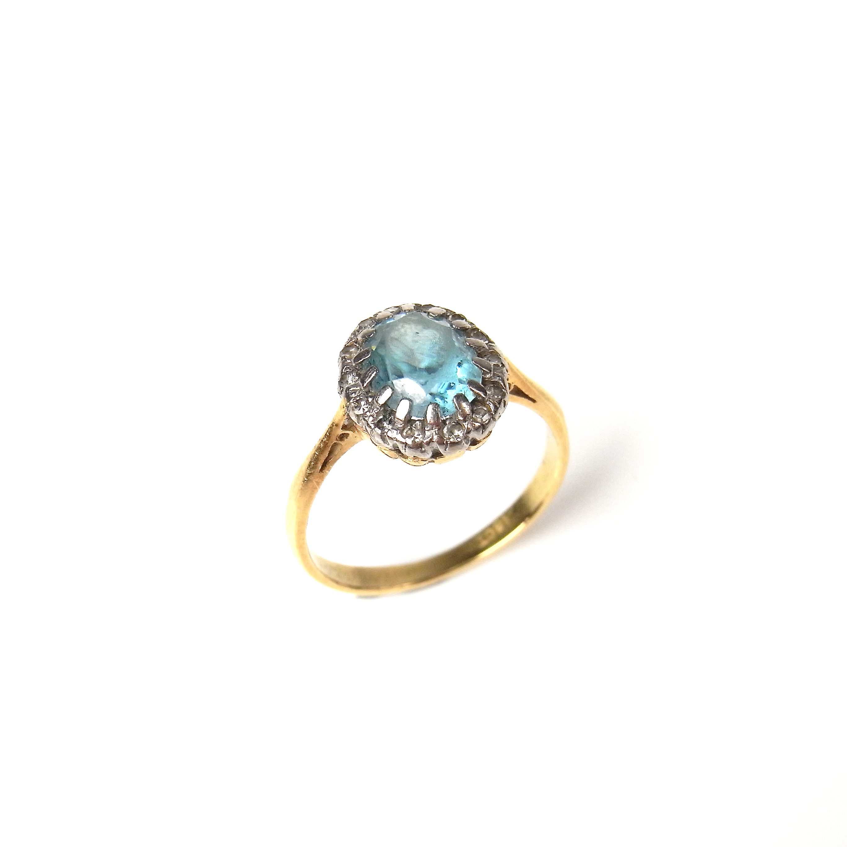 18 ct yellow gold blue topaz and diamond ring.