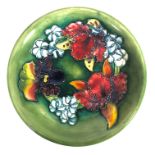 A Walter Moorcroft Orchid pattern plate, circa late 1940s