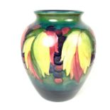 A large William Moorcroft Leaf and Berry pattern vase, circa 1940