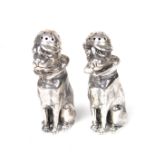 A Modern novelty silver pair of dog peppers