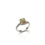 White gold opal and diamond ring.