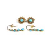 Two pairs of gold turquoise set earrings.