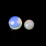 Two loose circular cut opals.