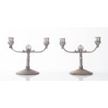 WMF - Germany, Inizio del XX secolo, Coppia di candelabri in peltro argentato.