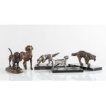 Lotto composto da cinque sculture raffiguranti “Cani” di diverse fogge e materiali, XX secolo.