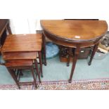 A mahogany nest of tables and a small demi-lune fold over card table (2) Condition Report: