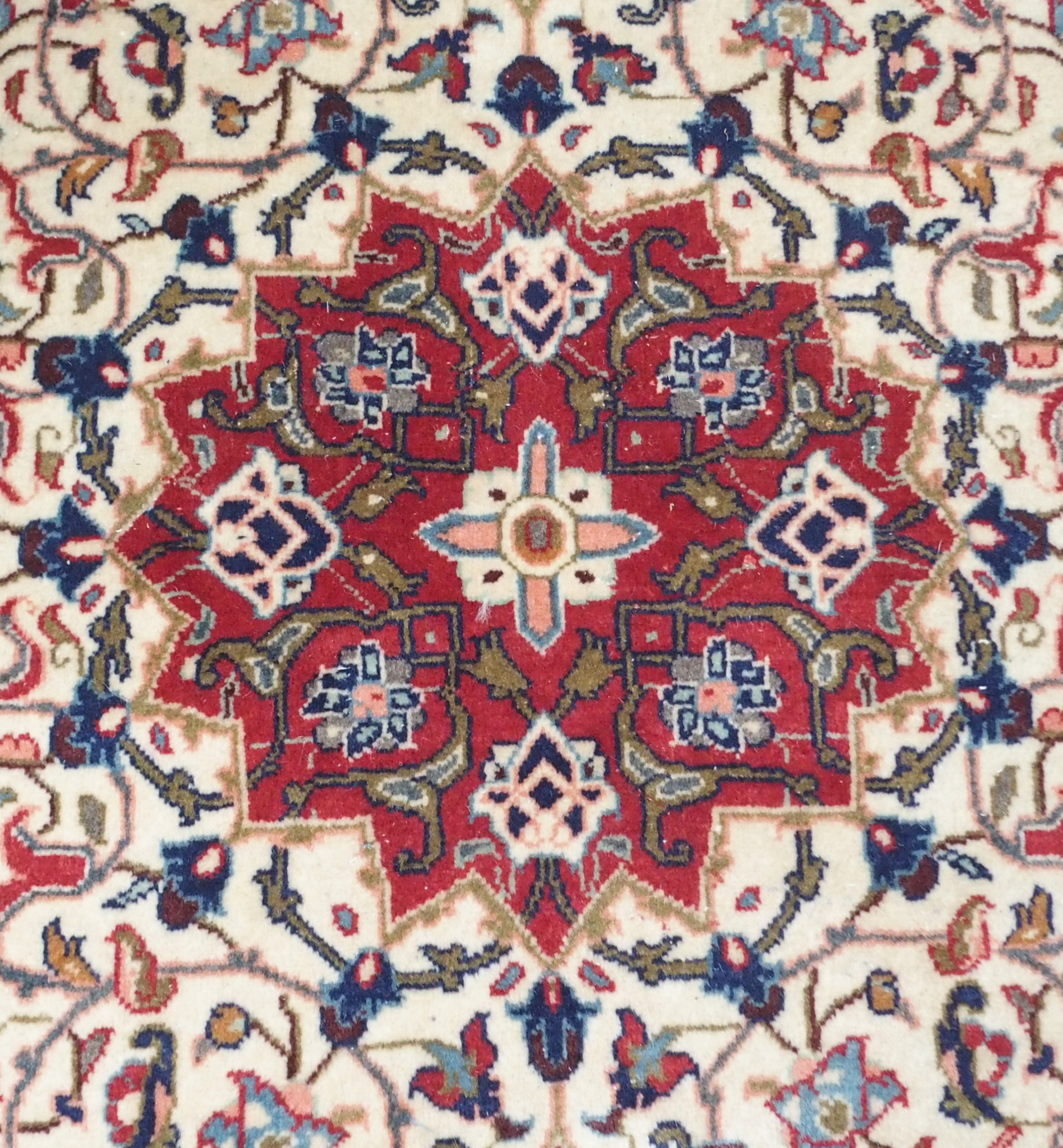 A cream ground Keshan rug with red central medallion and border, 208cm x 132cm Condition Report: - Image 2 of 4