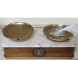 A set of scales with marble top and brass dishes Condition Report: Available upon request