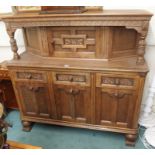 A carved oak court cupboard, 137cm high x 141cm wide x 54cm deep Condition Report: Available upon