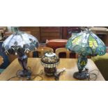 Two Tiffany style table lamps and a smaller Tiffany style table lamp (3) Condition Report: