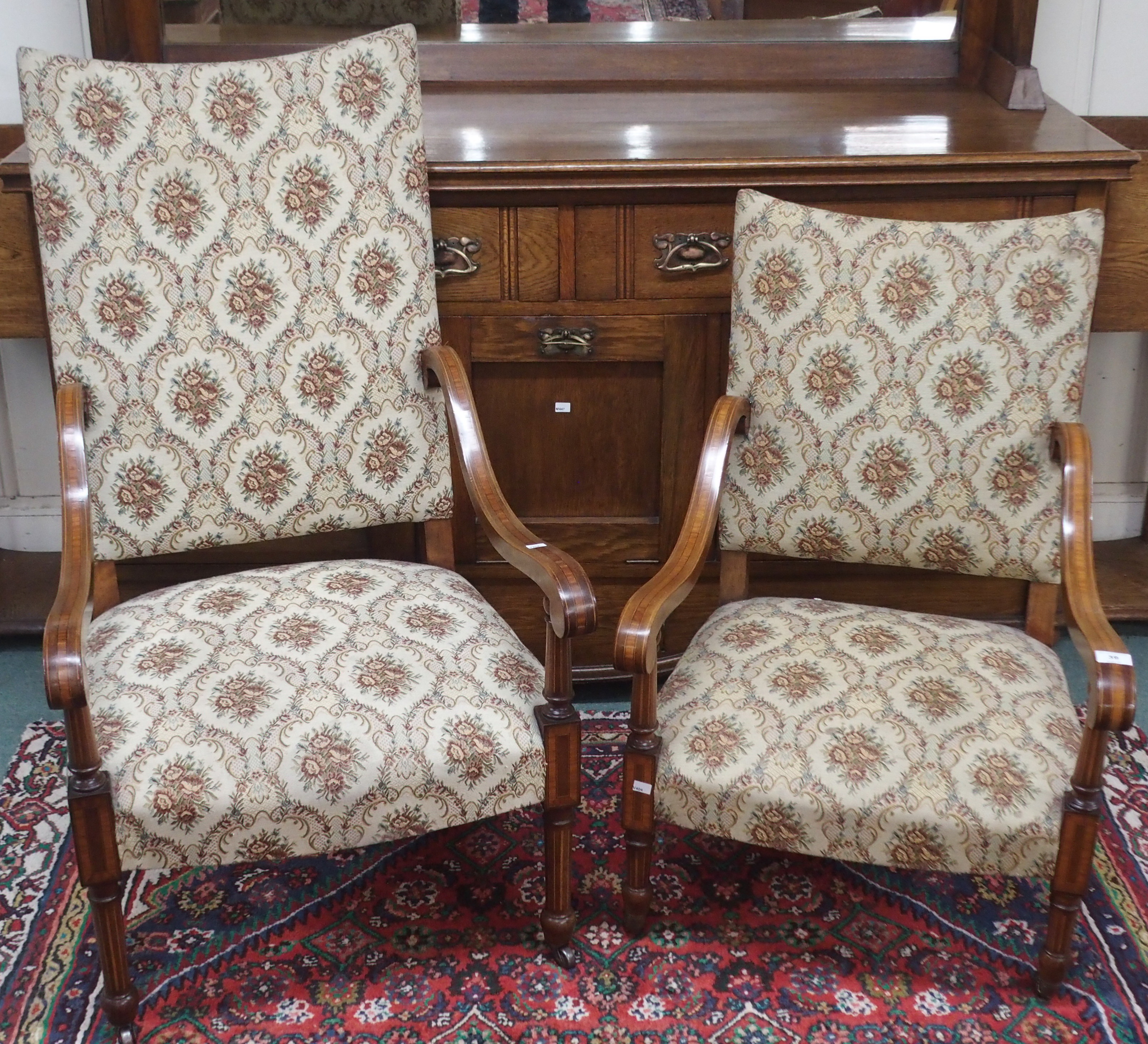 An inlaid mahogany open armchair with upholstered back and seat, 113cm high with a matching ladies