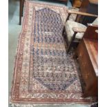 A blue ground Araak runner, 288cm x 112cm and an Eastern runner with geometric design, 242cm x