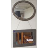 An Arts and Crafts wall mirror with purple roundels, 72cm x 51cm and a brass oval wall mirror,