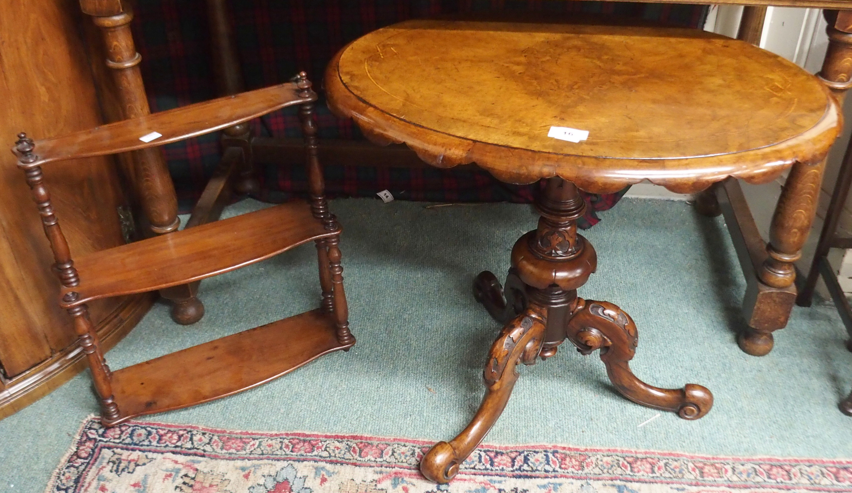 A Victorian walnut occasional table on a tripod carved base and a small three tier mahogany wall