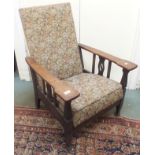 An oak framed reclining armchair Condition Report: Available upon request