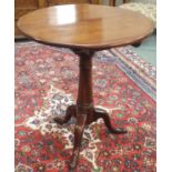 A mahogany circular tilt top occasional table on tripod base, 69cm high x 63cm diameter Condition