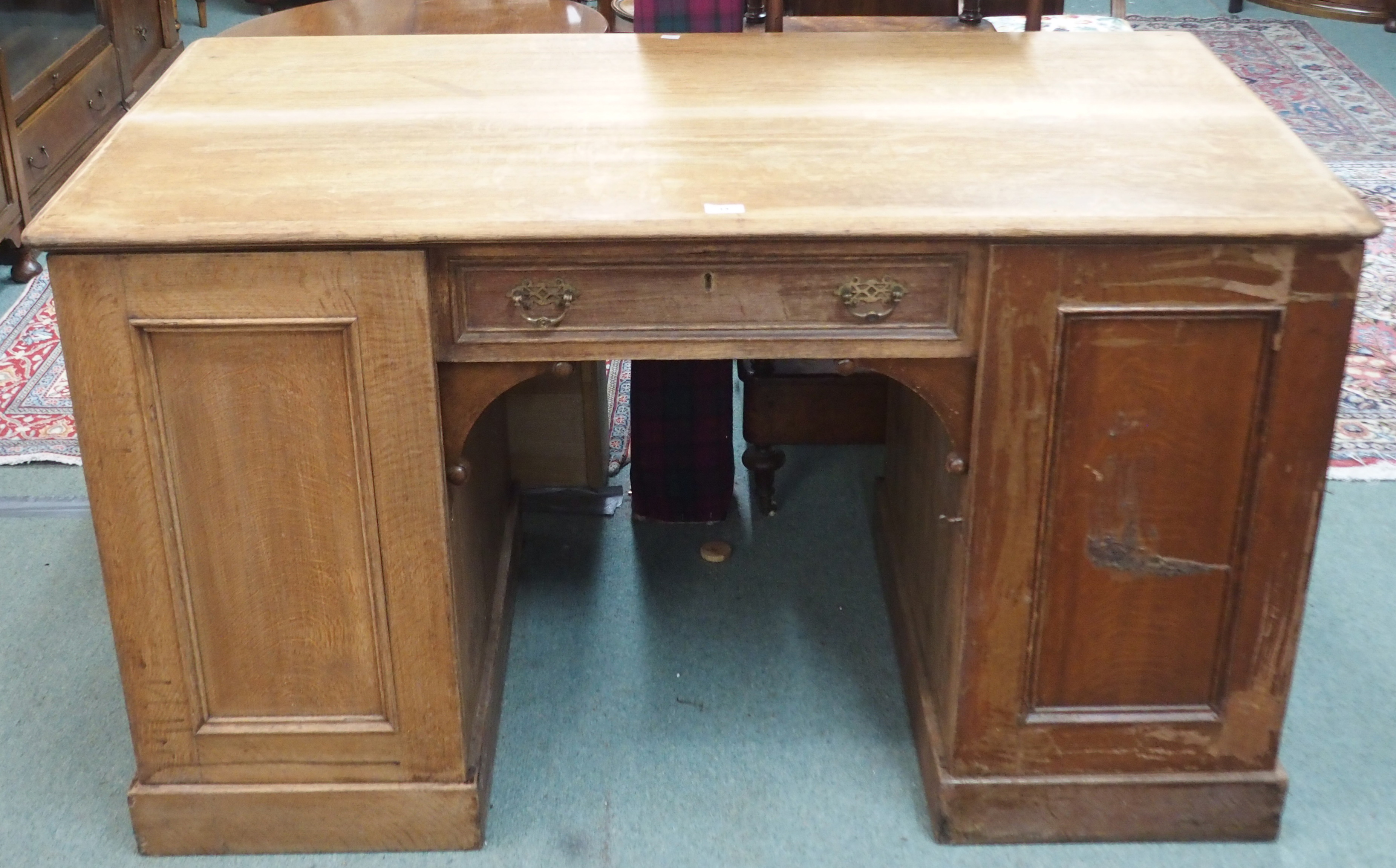 An oak partners pedestal desk, 80cm high x 137cm wide x 76cm deep Condition Report: Available upon