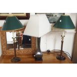 A pair of mahogany column table lamps and a modern lamp (3) Condition Report: