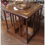 An inlaid mahogany revolving table top bookstand, 28cm high Condition Report: Available upon