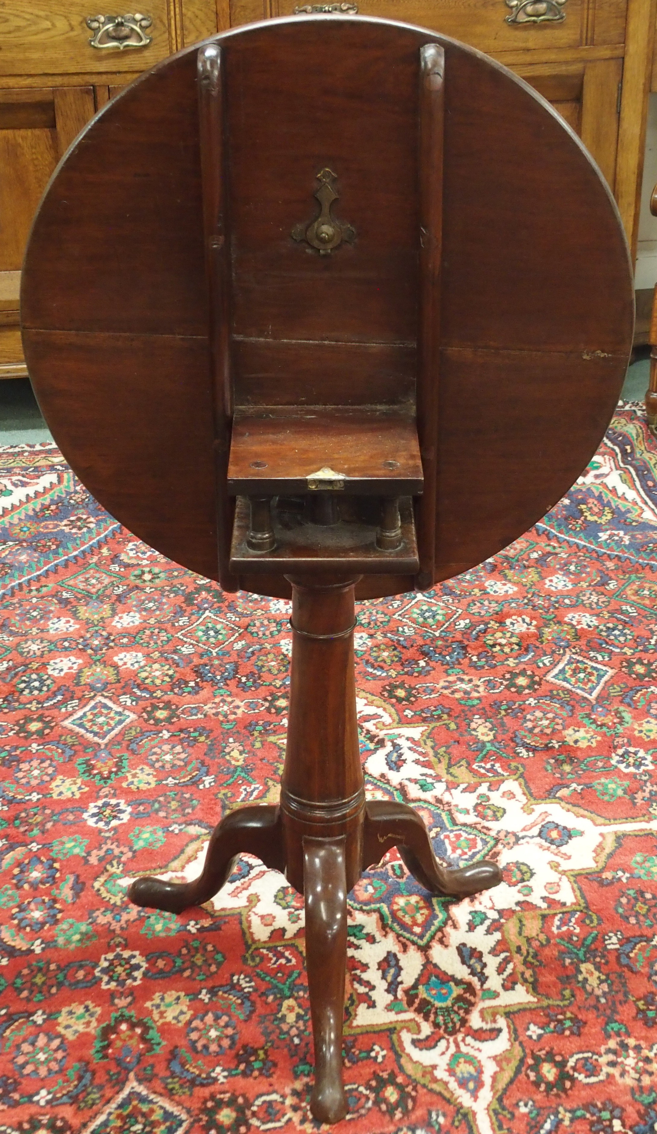 A mahogany circular tilt top occasional table on tripod base, 69cm high x 63cm diameter Condition - Image 2 of 2