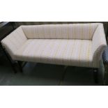An upholstered window seat with mahogany legs, 63cm high x 126cm wide x 48cm deep Condition