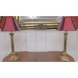 A pair of David Hunt brass column table lamps retailed by Harrods of London (2) Condition Report: