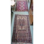 A red ground Hamadan rug 152cm x 80cm and a baluch rug 132cm x 73cm (2) Condition Report: