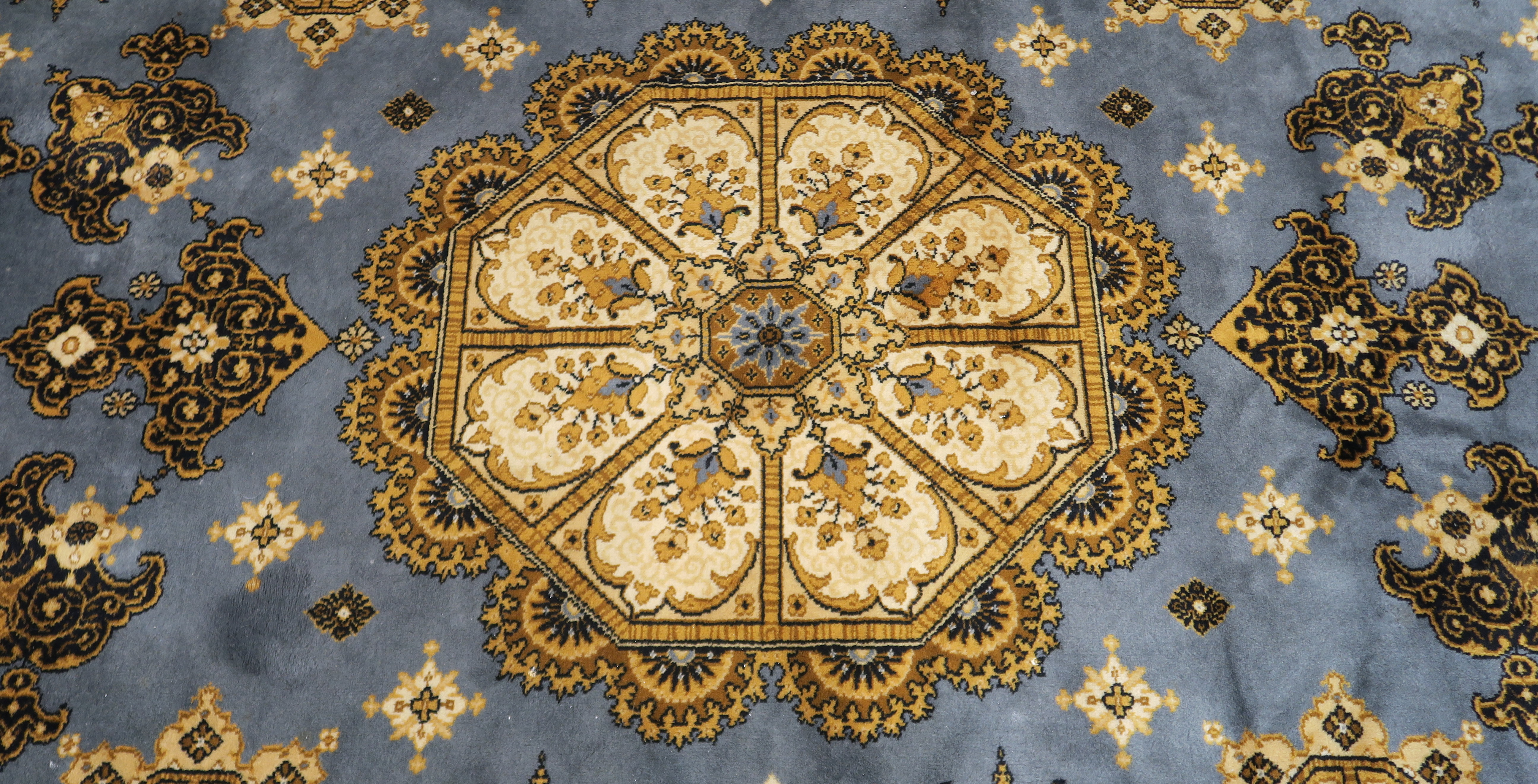 A blue ground Louis de Poortere rug with central medallion, 200cm x 300cm Condition Report: - Image 2 of 5