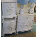 A cream cabinet with painted flowers, 82cm high x 72cm wide x 37cm deep and a pair of matching three