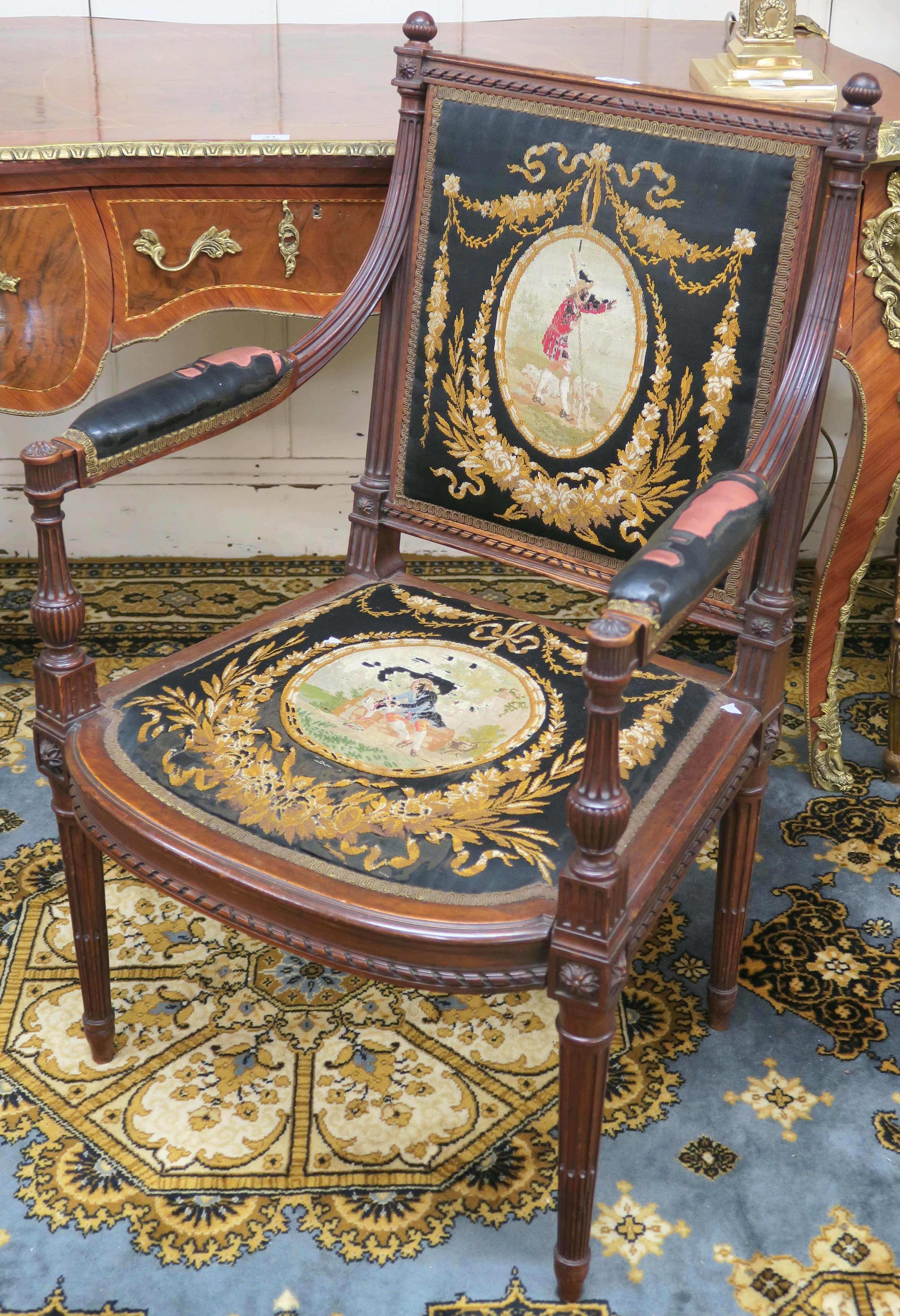 A FRENCH EMPIRE STYLE MAHOGANY OPEN ELBOW CHAIR by Loidrault of Paris the square back with half