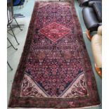 A rich blue ground full pile Persian Soroka runner with central medallion, 300cm x 117cm Condition