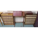 A mahogany bookstand and a pair of mahogany bookcases with Encyclopedia Britannica and childrens