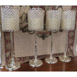 Four candle holders with battery candles 81cm high (4) Condition Report: Available upon request