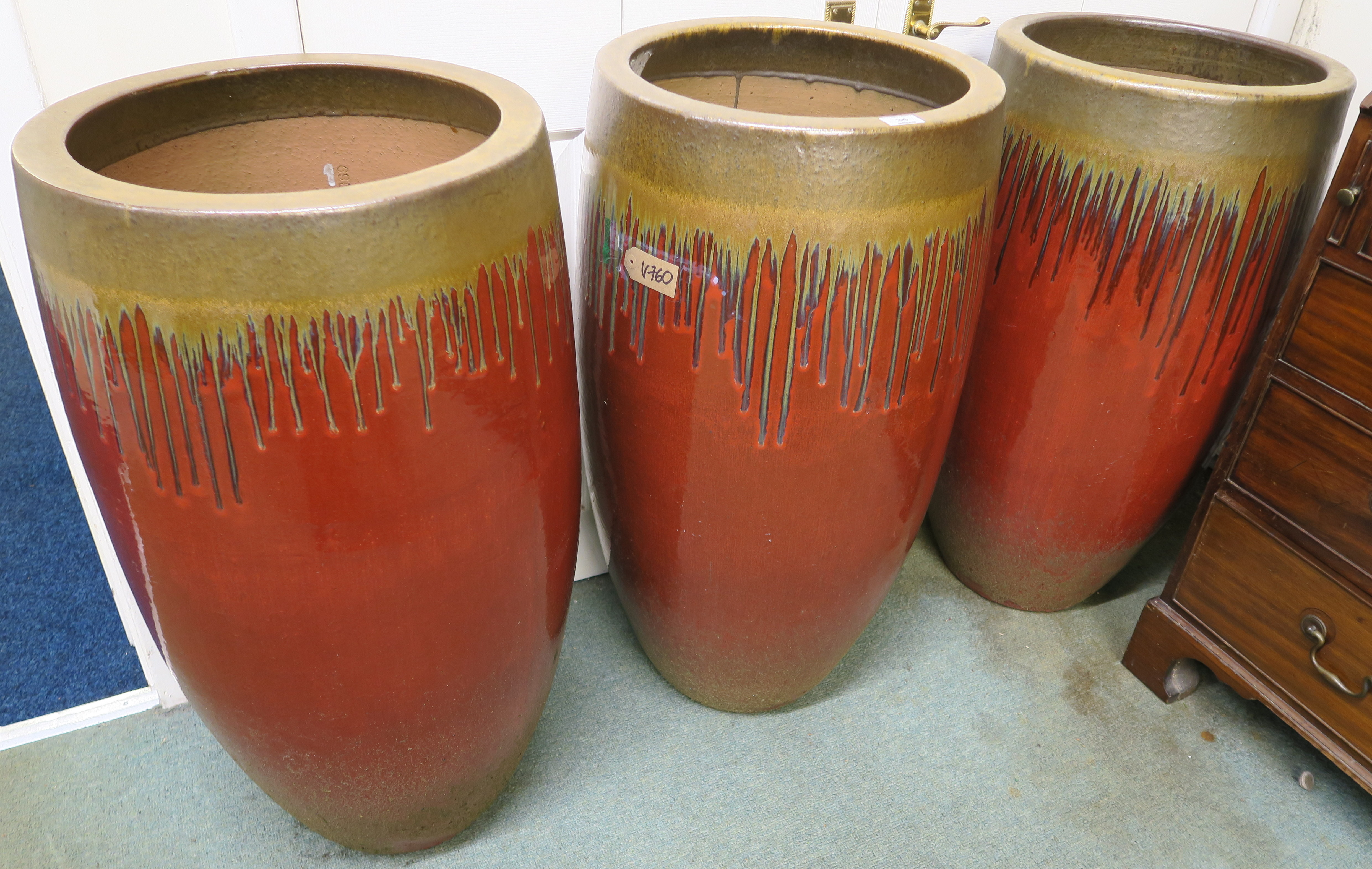 Three very large modern red glazed garden planters, 89cm high x 44cm diameter (3) Condition