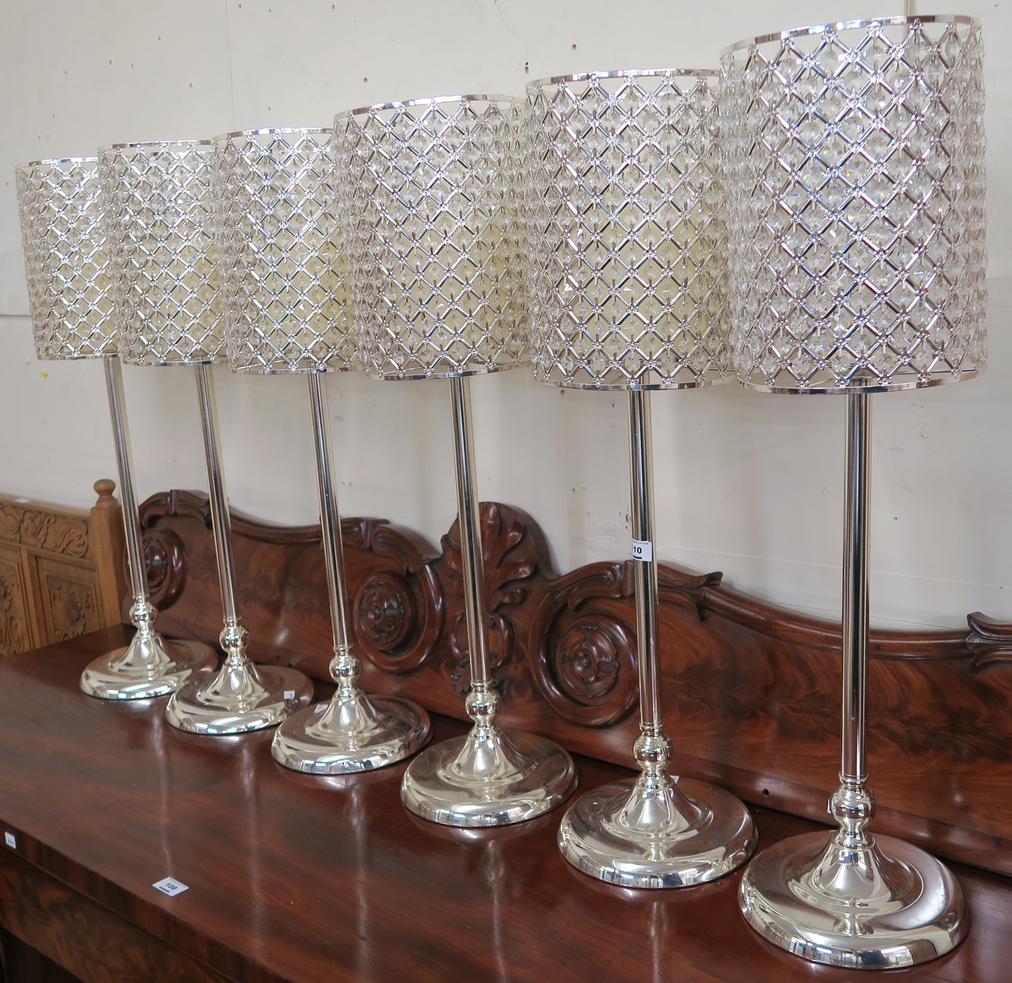 Six candle holders with battery candles , 81cm high (6) Condition Report: Only five candles