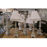 Three candle holders and a pair of table lamps (5) Condition Report: Available upon request