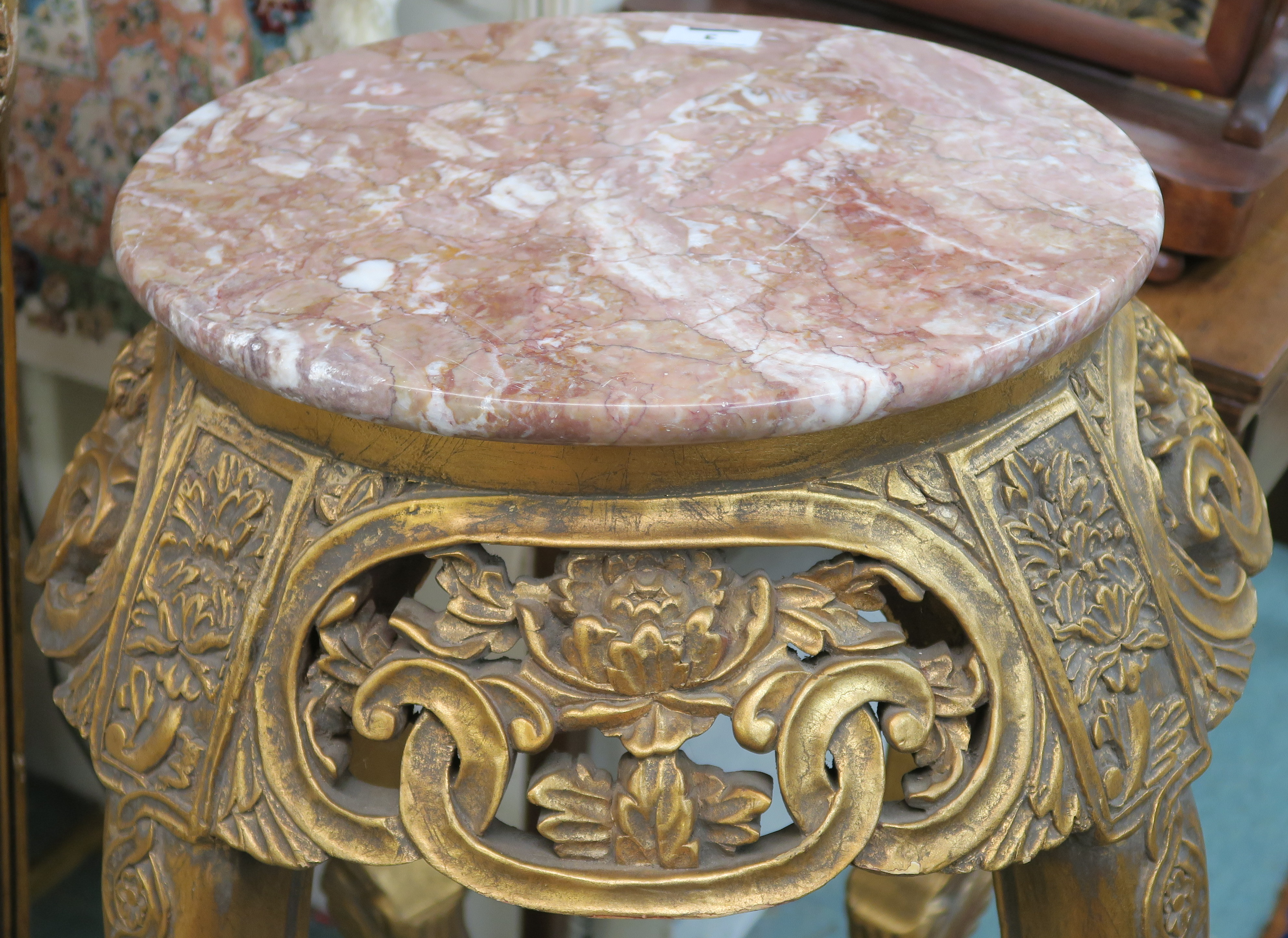 A gilt plant stand with carved frieze and pink marble top, 92cm high Condition Report: Available - Image 2 of 2