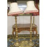 Two gilt standard lamps (2) Condition Report: Available upon request