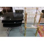 A nest of three glass and chrome tables and three brass side tables (4) Condition Report: