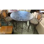 A circular breakfast table with tile top on a metal base 102cm high x 100cm diameter with two bar