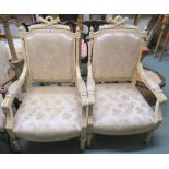 A pair of cream armchairs upholstered with a floral fabric (2) Condition Report: Available upon