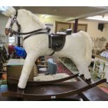 A small modern rocking horse, 76cm high Condition Report: Available upon request