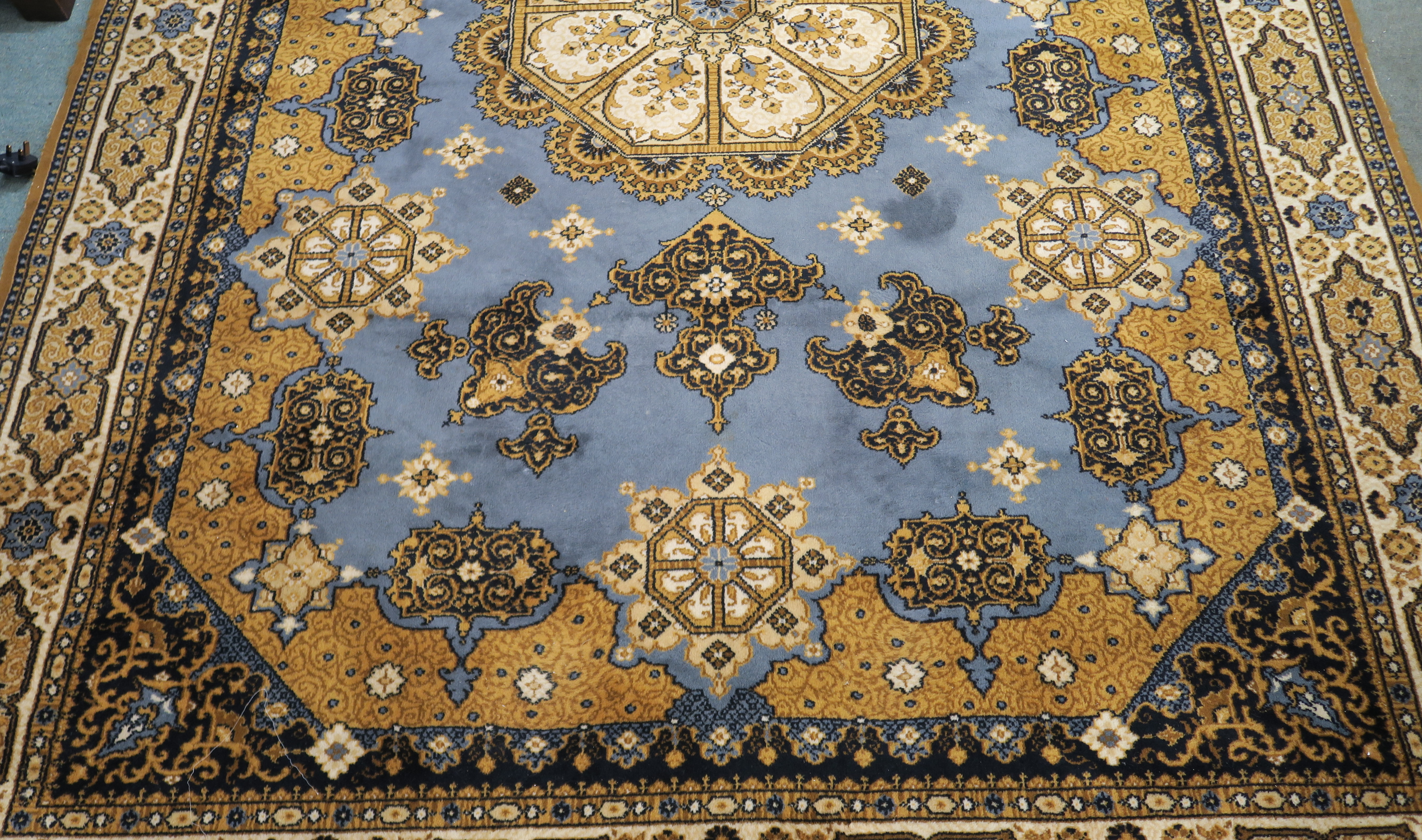 A blue ground Louis de Poortere rug with central medallion, 200cm x 300cm Condition Report: - Image 3 of 5