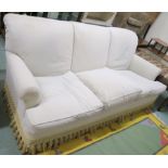 A hand made Peter Dudgeon "Turkpatrick" beige three seater sofa, 90cm high x 220cm wide x 110cm deep