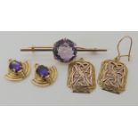 A yellow metal amethyst brooch, 9ct amethyst earring drops and a further pair of Celtic knotwork
