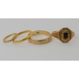 A 10k college ring dated 1934, size P1/2, a 10k child's ring size B, weight together 4gms, a 22ct