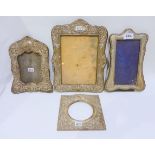 A lot comprising four silver mounted photo frames, various makers and marks, the longest 29cm x