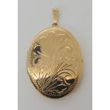 A 9ct gold oval locket, dimensions 5.3cm (including bail) x 3.1cm, weight 11.6gms Condition