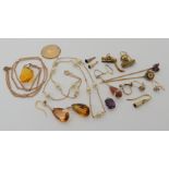 A mixed lot of yellow metal items, to include citrine drops, gem set stick pins, faux pearl set